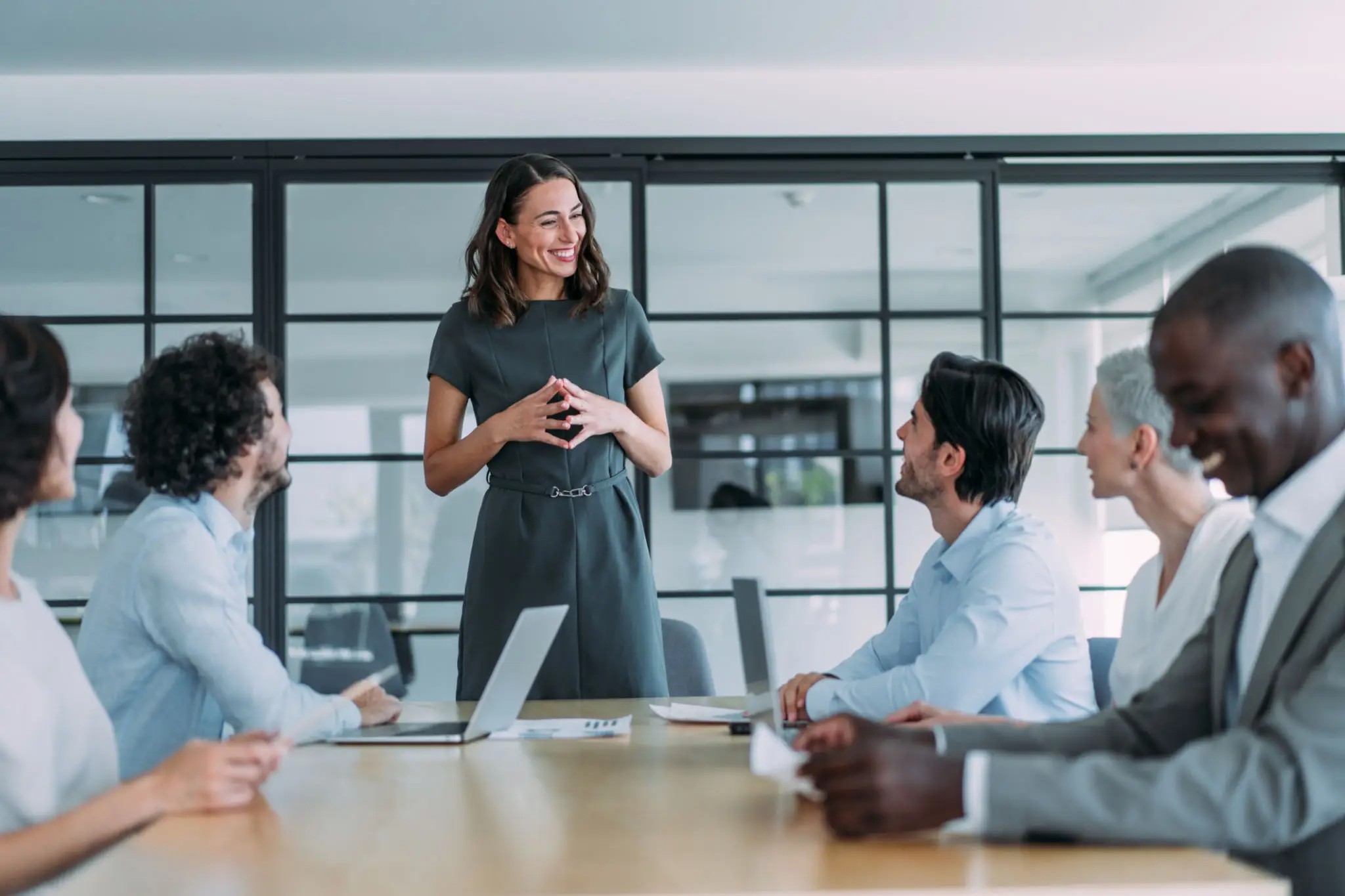 Business meeting with people around a table.
