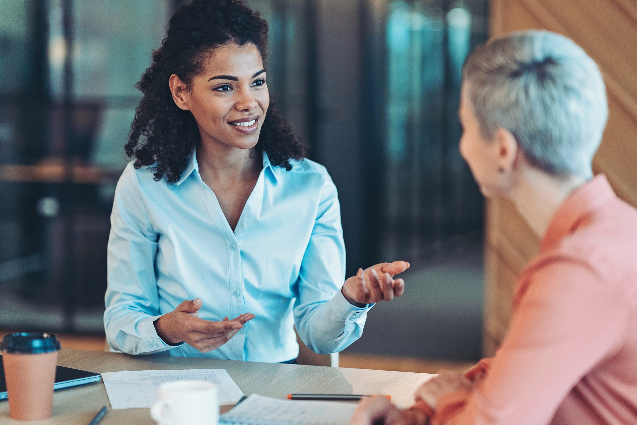 Two women having a business discussion.