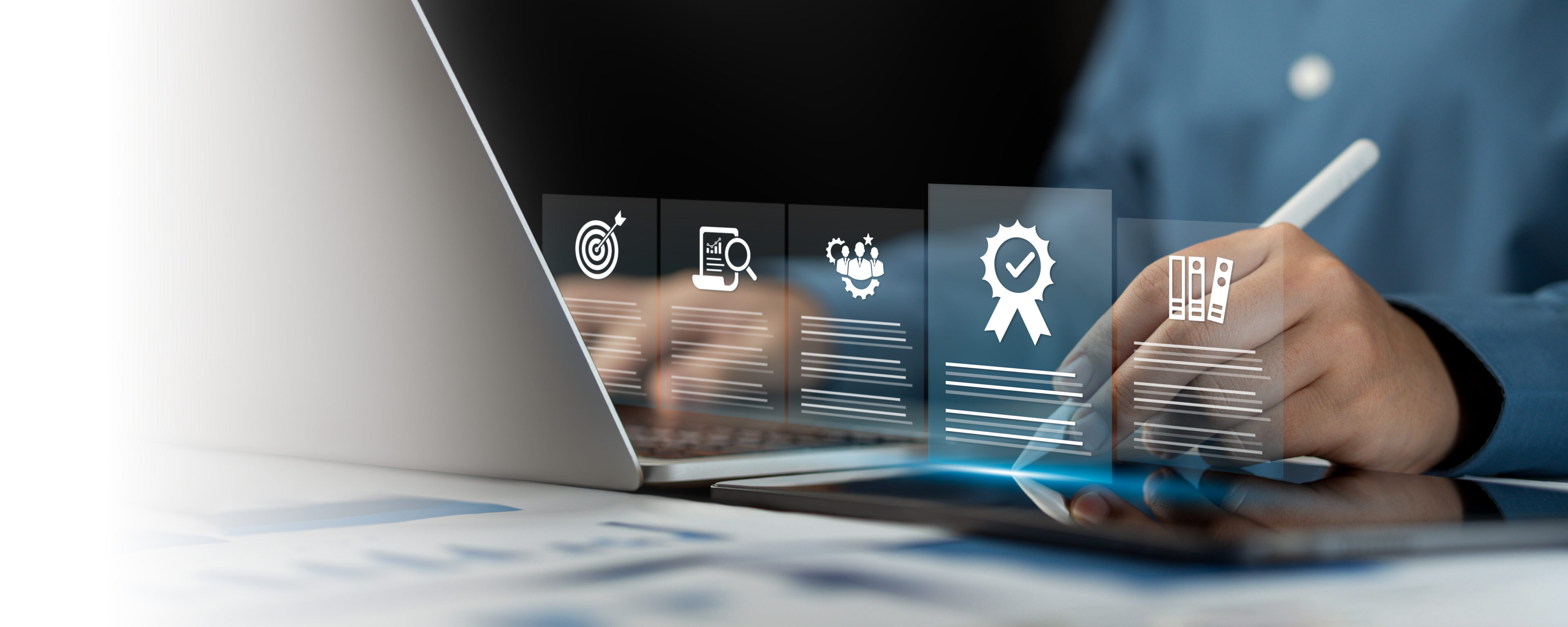 Person working on laptop with digital icons.